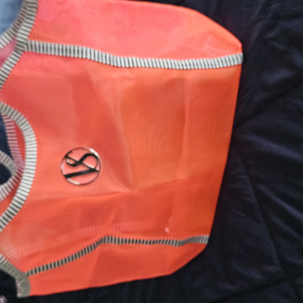 Stylish Orange Tote Bag with Silver Accents
